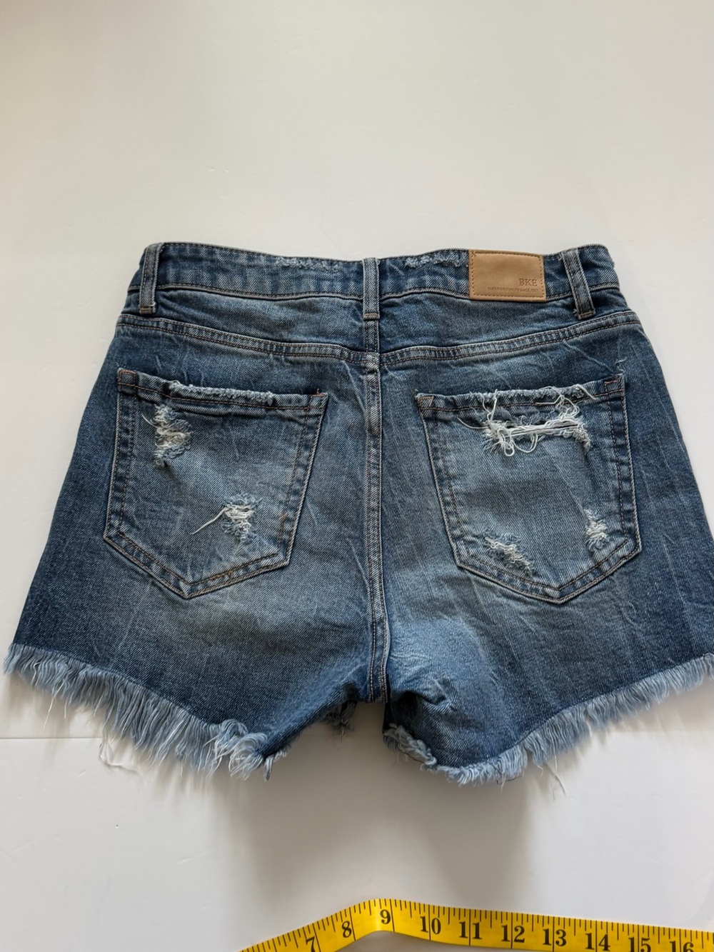 BKE Women's Distressed Blue Denim Cutoff Shorts